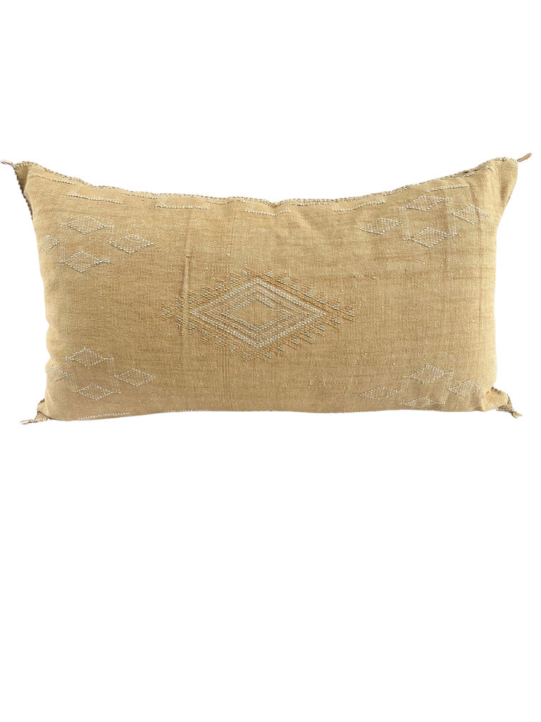 Neutral Cactus silk cushion displaying exquisite handstitched patterns, bringing a touch of Moroccan charm to your home.