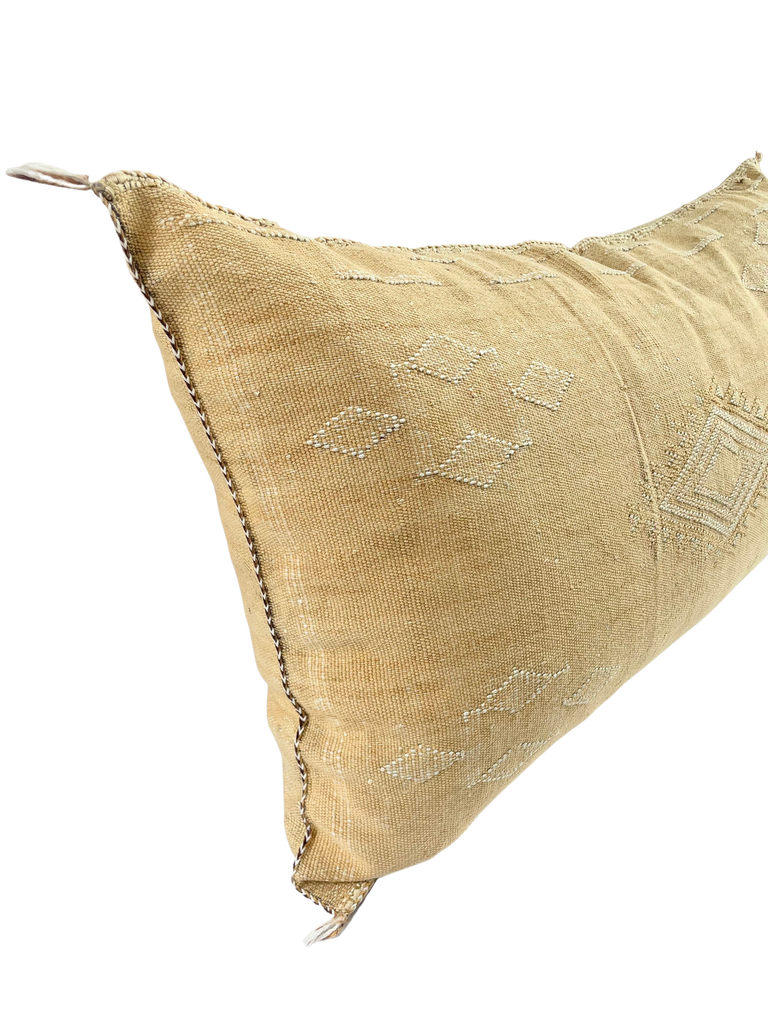 Vintage Moroccan pillow displaying exquisite patterns.