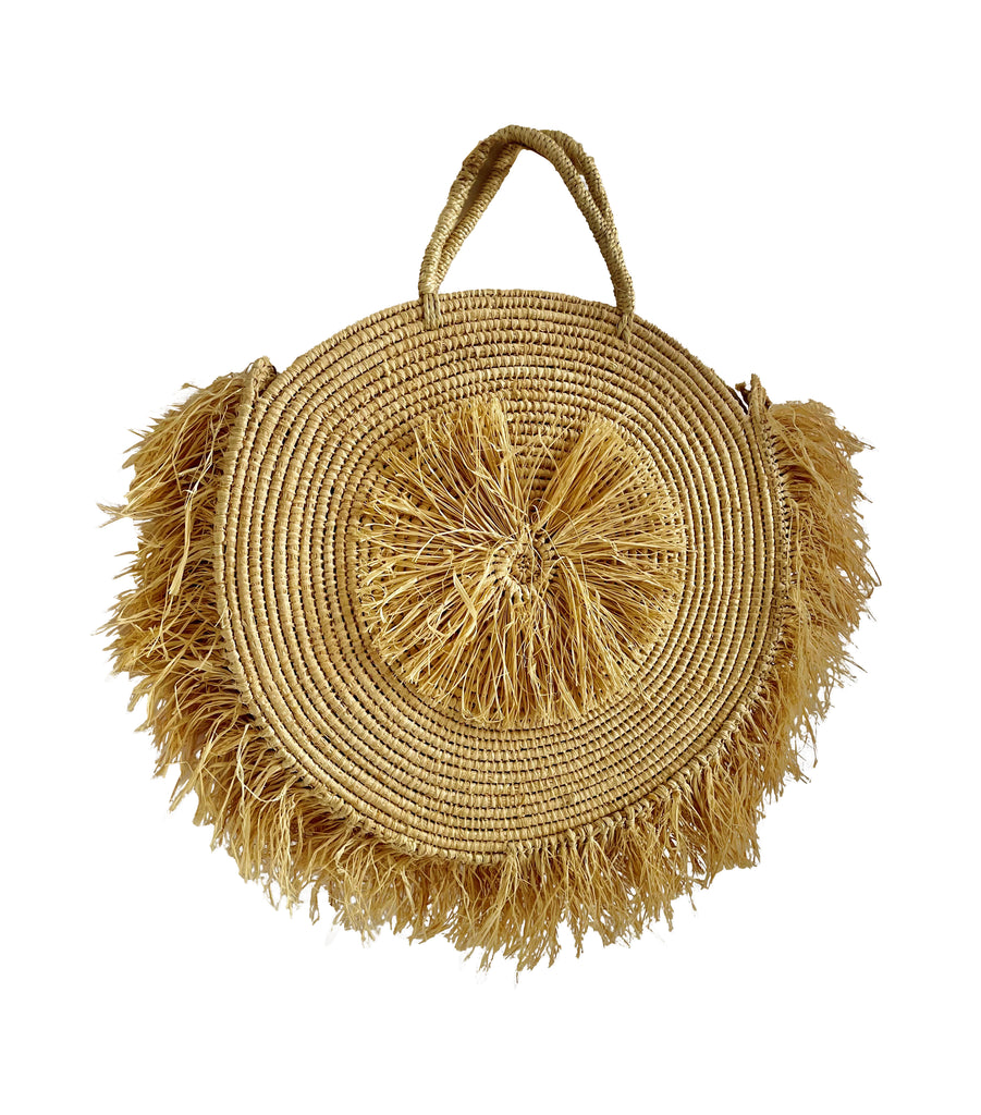 The raffia bag a stylish and functional accessory to complement your Moroccan rugs.