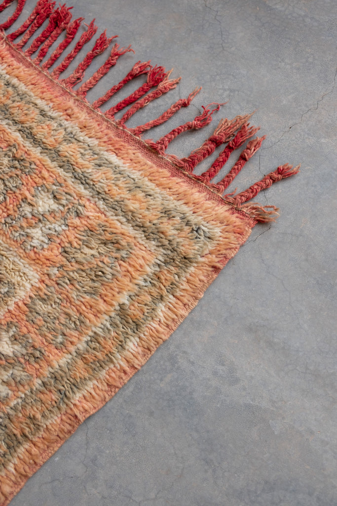 The vintage Moroccan rug  a neutral and elegant addition from Moroccan Tribe.