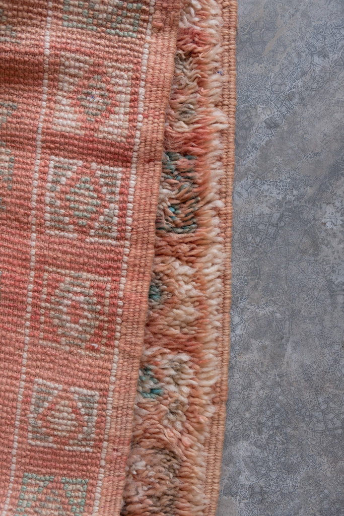 Vintage Moroccan rug from Australia displaying contemporary tribal designs.