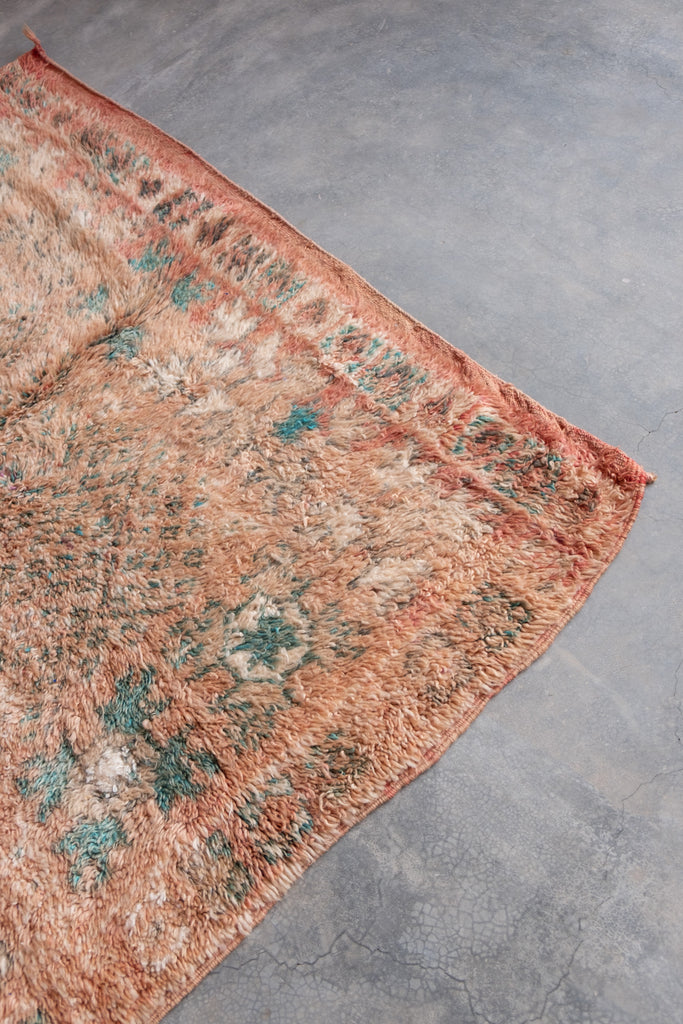 Vintage Moroccan rug showcasing intricate tribal patterns.