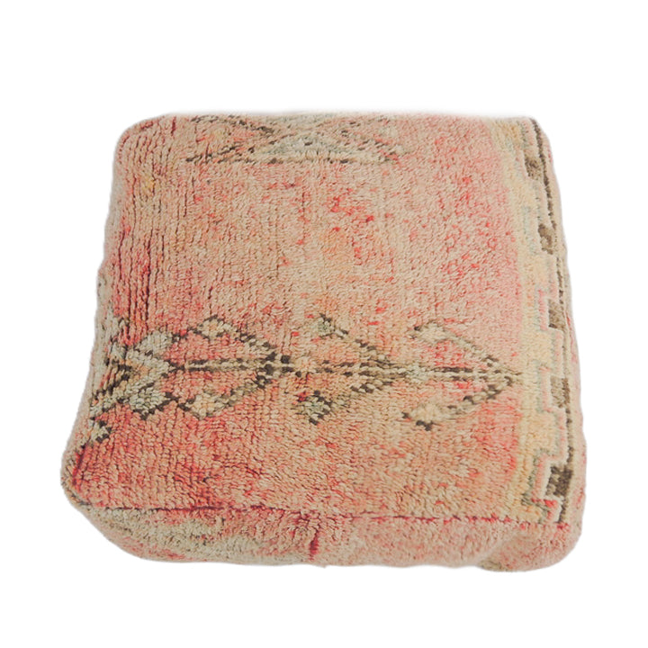 Vintage Moroccan floor cushion in faded pink.